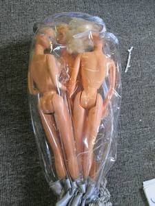2 barbies and a ken ...