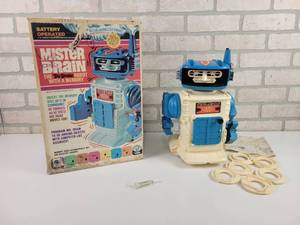 lot 42 image: 1970 Mister Brain The Tru-Smoke Robot with a Memory - Includes (6) Memory Discs and Original Box - Robot is Approx. 13 Tall