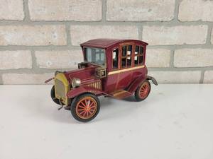lot 66 image: 1960s Rosko Toy Grand-Pa Car Battery Operated Tin Litho Ford Model T - Approx. 9 x 6 x 5