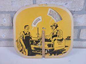 lot 83 image: Vintage CATERPILLAR Tractor Co. Promotional Mechanical Hand Fan - Approx. 10 x 9