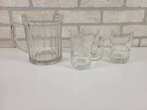 lot 97 image: Early Anchor Hocking Beer Pitcher and (3) Mugs