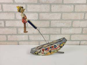 lot 126 image: MARX 1939 Walt Disney PINOCCHIO THE ACROBAT Tin Litho Wind-up Toy - WORKS See Video