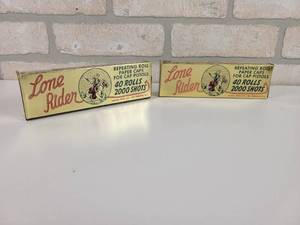 lot 136 image: (2) Vintage Lone Rider Repeating Roll Paper Caps - Boxes are Full - Each is Approx. 7 Long