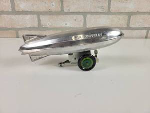 lot 139 image: Vintage Aluminum Schylling GRAF ZEPPELIN Wind Up Toy - Approx. 9.5 Long - WORKS