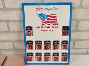 lot 142 image: Vintage KRON Imperial Spirit of 76 American Flag Display of Lighters - Complete w Original Packaging and 12 Lighters Approx. 14 x 10