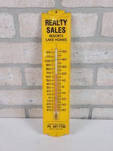 lot 148 image: Vintage Tin Advertising Thermometer - Realty Sales Detroit Lakes, MN - Approx. 13 x 3