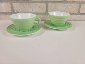 lot 172 image: Vintage HAZEL ATLAS Green Dishes - (2) Cups & Saucers