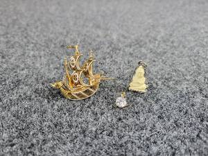 lot 2025 image: Vintage Damascene Spanish Ship Pin, Double-Sided Carved Buddha Charm and Solitaire Gemstone Pendant in Modern Goldtone Setting