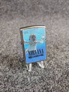 lot 2034 image: Zippo Lighter with NirvanaNevermind Album Artwork