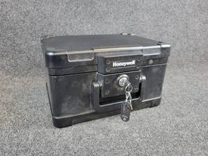 lot 2055 image: Used Honeywell Locking Fireproof Box with Keys