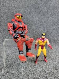 lot 2058 image: Pair of Action Figures - Joyride Halo Spartan, 7-12 tall (2003) and Wolverine, 4-14 tall (1984)