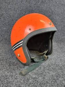 lot 2059 image: Vintage Orange Helmet with Black and White Stripes