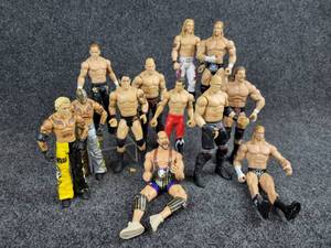 lot 2065 image: Lot of (12) WWE Wrestlers from 2010 by Mattel