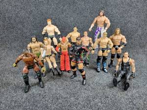 lot 2066 image: Lot of (12) WWE Wrestlers from 2010 by Mattel