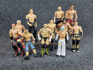 lot 2068 image: Lot of (11) WWE Wrestlers from 2011 by Mattel