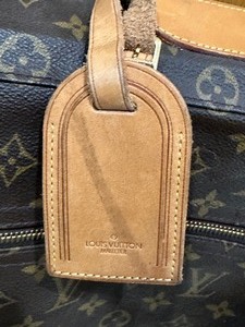 lot 93 image: Luis Vuitton Garment Bag