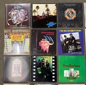 lot 216 image: Rock and Roll 25 Record Albums includes Record LP The Doors Greatest Hits & Record LP Prince Around the World in a Day