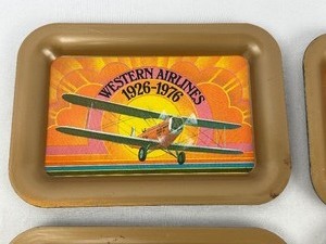 lot 156 image: Four Small Western Airlines Souvenir Tin Trays