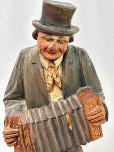 lot 347 image: Vintage Carved Wood Figurine - Vintage Carved Accordion Playing Figurine
