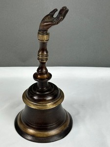 lot 342 image: Vintage Hand Figurine Metal Bell