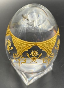 lot 249 image: Golden Accented Baccarat Crystal Egg and Stand