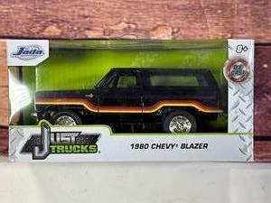 lot 32 image: 1980 Black Chevy Blazer Jada Just Trucks Diecast