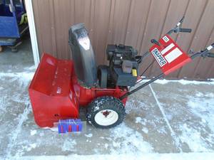 Snapper 824 snow blower with electric start. Good used condition. As shown.