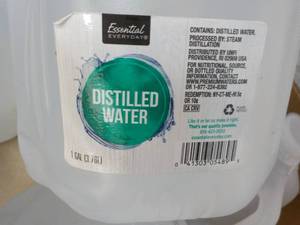 6 Gallons Distilled Water...