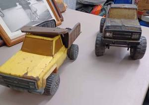 Two Tonka Trucks Tonka Dump Truck and a Tonks 4X4 Pickup with Large Whip Antenna (Sandbox Toys)