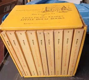 Nine Volume Paperback Set of Little House Books by Laura Ingalls Wilder in a Cardboard Display (Torn on One Corner)