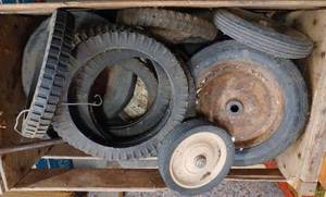 Wooden Crate Full of Peddle Car Hard Rubber Tires and Wheels, and Assorted Lawn Mower Hard Rubber Wheels