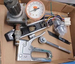 5-Gallon Pail of 3 Caulk Guns, 5 Tubes of Assorted Sealers, Box with 38-inch Ratchet, Tacker Gun, Level, and Hardware