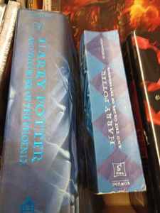 Box of Six Books, Two Harry Potter Books, and Four Books by Stephenie Meyer - Eclipse, Breaking Dawn, Twilight