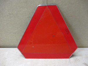 Slow moving vehicle sign