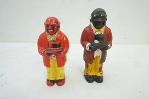 uncle moses cast iron coin bank and pepper shaker