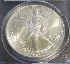 1986 AMERICAN SILVER EAGLE MS69 PCGS FIRST YEAR OF SERIES
