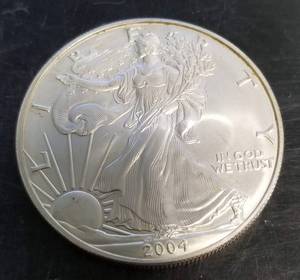 2 US SILVER DOLLARS 1882-O MORGAN 2004 SILVER EAGLE