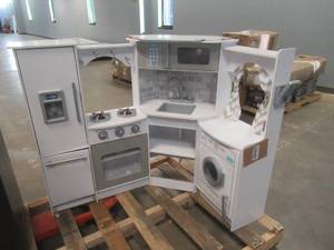 lot 809 image: KidKraft Ultimate Corner Wooden Play Kitchen with Lights & Sounds, Play Phone and Curtains, White (BOTTOM SHELF NEEDS REATTACHMENT, MISSING KICK PLATE, MISSING ONE HANDLE)