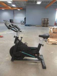 lot 827 image: XOOPON Indoor Exercise Bike Stationary Cycling Bicycle Cardio Fitness Workout, Model 707, Missing Front Stabilizing Floor Bar, SOLD AS IS.