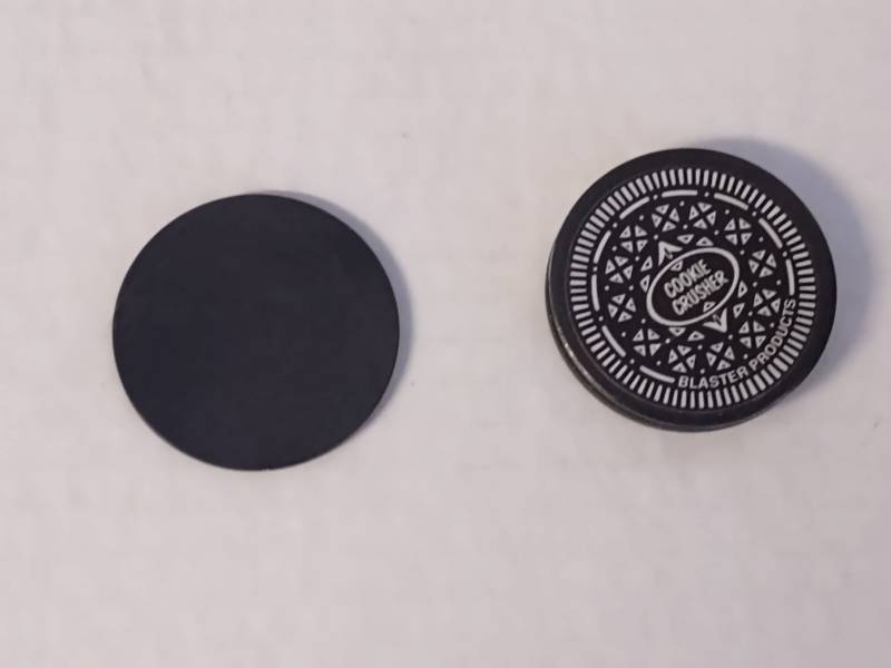 lot 86 image: Beautiful X-Men Gold and Black Heavy Pog and Realistic Oreo Pog