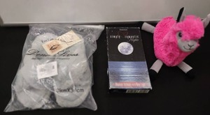 lot 19 image: Comfy Package of Slippers, Plush and Romantic Nights Gift Set