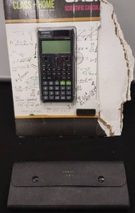 lot 22 image: Scientific Calculator and Vintage Protractor Set and Case