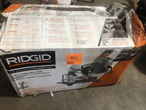 RIDGID  15 Amp Corded 12 in. Dual Bevel Sliding Miter Saw with 70 Deg. Miter Capacity customer return see pictures