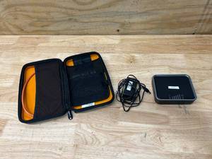 lot 7 image: NETGEAR 4G LTE Modem (LB1120) with Soft Case