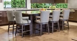 lot 103 image: Seven A. Rudin Counter Height Barstools With Brushed Nickel Footrests