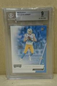 2020 Playoff Justin Herbert #203 Rookie Card - Beckett 9