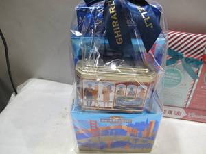 lot 89 image: NEW Chocolate Lovers 3 Gift Set - Ghirardelli Tower, Hot Chocolate 3 Pack and Chocolate Cookie 4 Pack