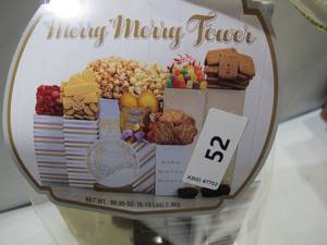 lot 55 image: NEW Houdini Merry Merry Tower Featuring over 6 lbs of Gourmet Treats