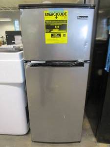 lot 504 image: Magic Chef 4.5 cu. ft. 2 Door Mini Fridge in Stainless Look with Freezer (DENT IN CORNER, SMALL DING ON FREEZER DOOR, NEW CONDITION)