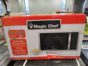lot 547 image: Magic Chef 1.6 cu. ft. Countertop Microwave in Stainless steel with Gray Cavity (OPEN BOX)